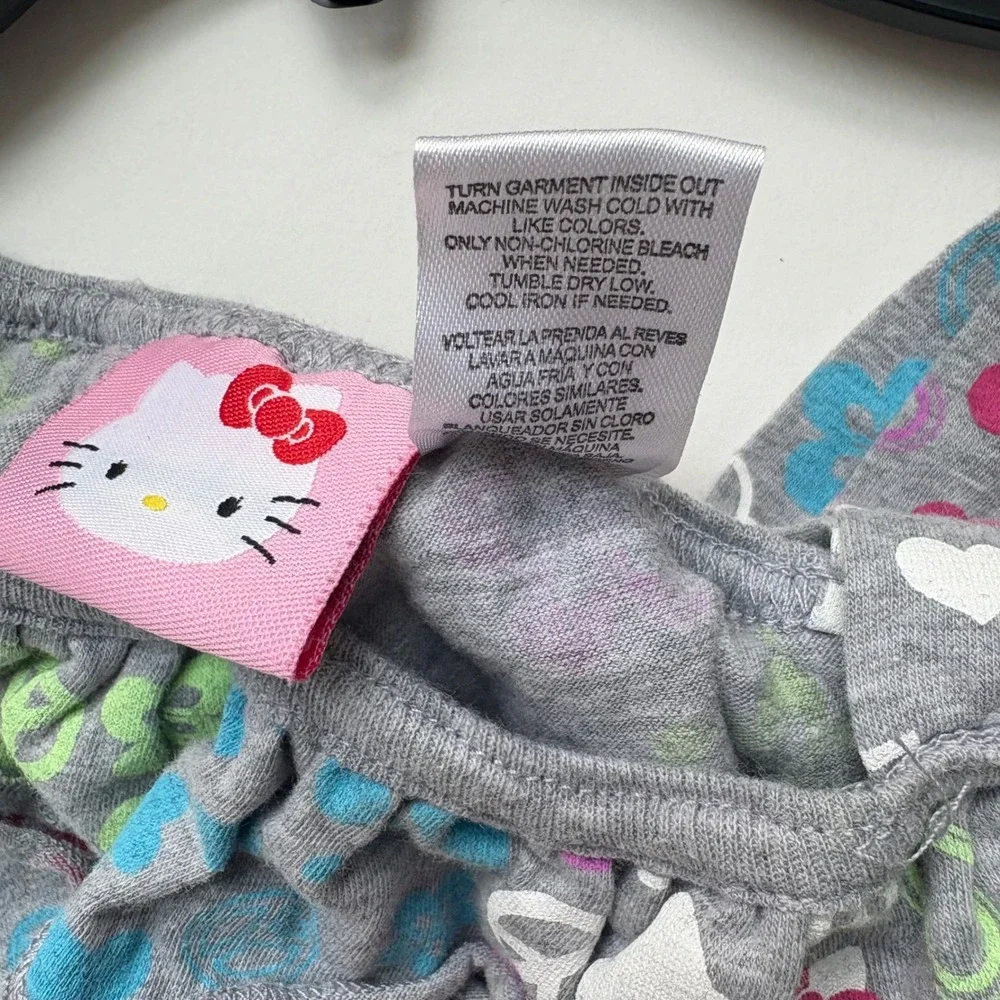 Hello Kitty‎ Romper Jumpsuit Ruffle Trim Hearts Peace Signs Gray Girls L (10/12)